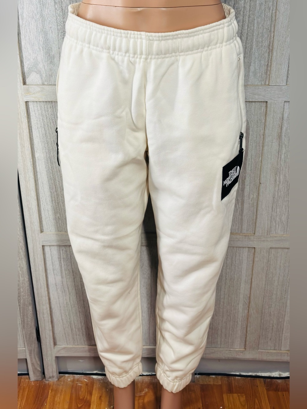 The North Face Cream Fleece Joggers with Zip Patch